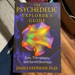 Cover of "The Psychedelic Explorer’s Guide" by James Fadiman, featuring a colorful, abstract design representing consciousness and safe psychedelic journeys.